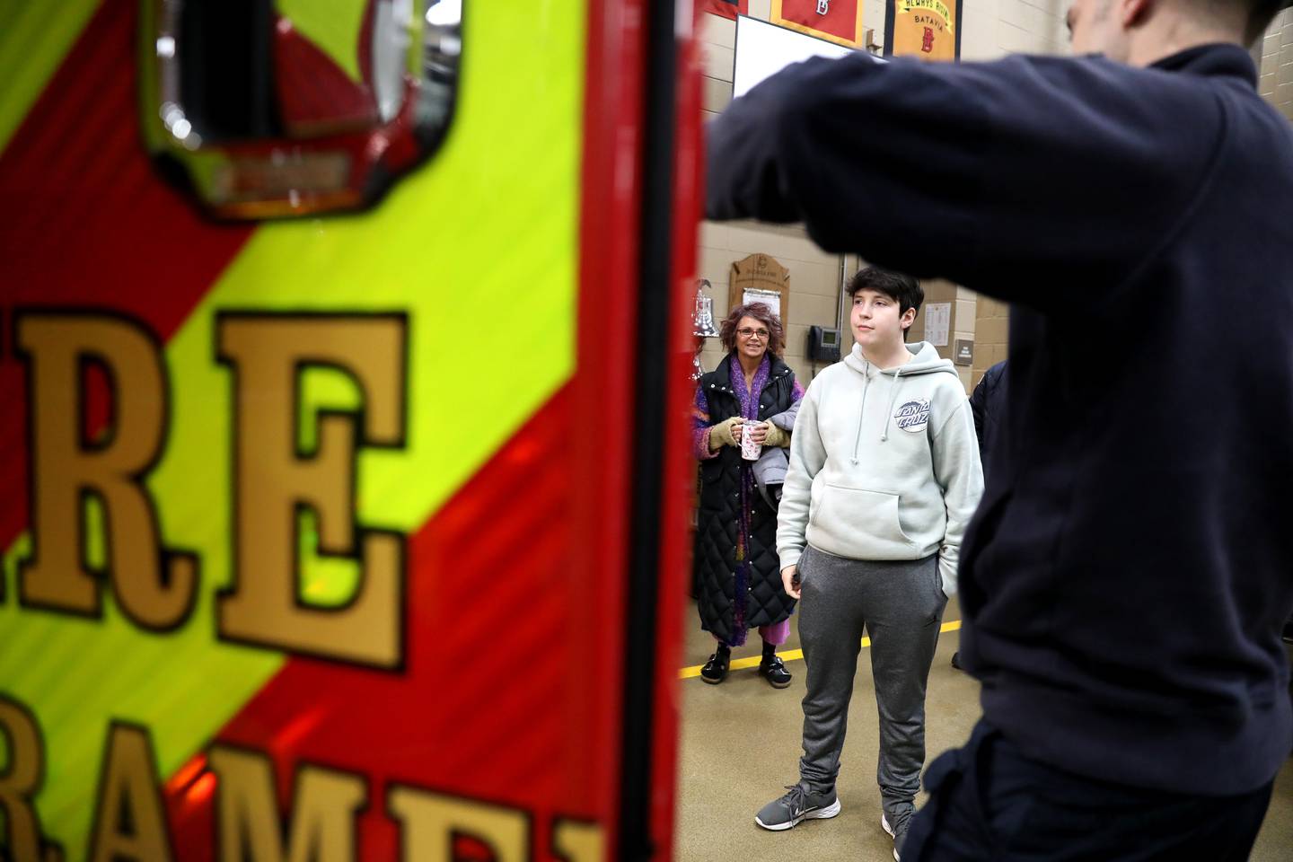 Brice Worley, 16, a junior at Batavia High School, gets a tour of an ambulance at the Batavia Fire Department’s Wilson Street Station. Worley was born with a brain tumor that was dormant until 2019. He hopes to study to become a paramedic.