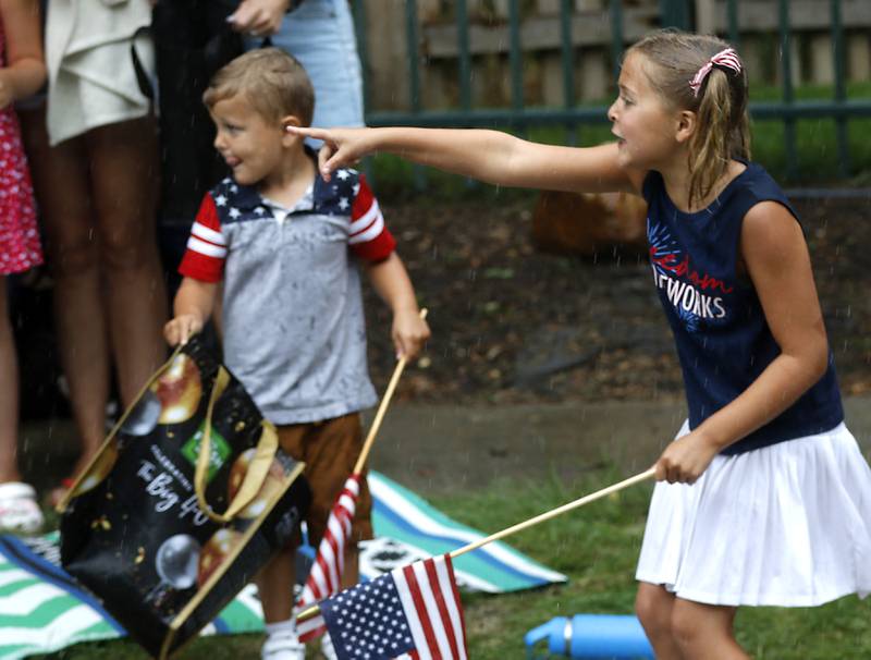 Isla Foley, 8, of Crystal Lake reacts to float on  Sunday, July 7, 2024, during Crystal Lake’s annual Independence Day Parade on Dole Avenue in Crystal Lake. This year’s parade feature close to 100 units.