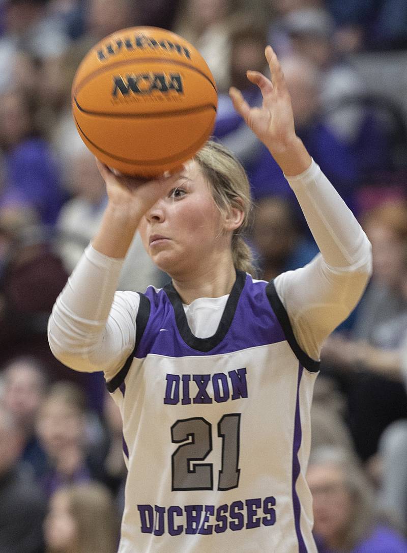 Dixon’s Reese Dambman puts up a 3-point shot against Geneva Thursday, Feb. 19, 2026, in the Class 3A girls basketball regional title game.