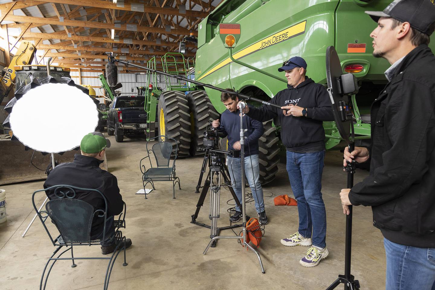 Illinois Farm Bureau’s video production team interviews farmer Michal Ganschow of Bureau County during a final shoot for its new documentary “Sustaining Our Future: A Farm Family Story.” Ganschow is a third-generation farmer, who with his family, has helped pioneer on-farm conservation practices.