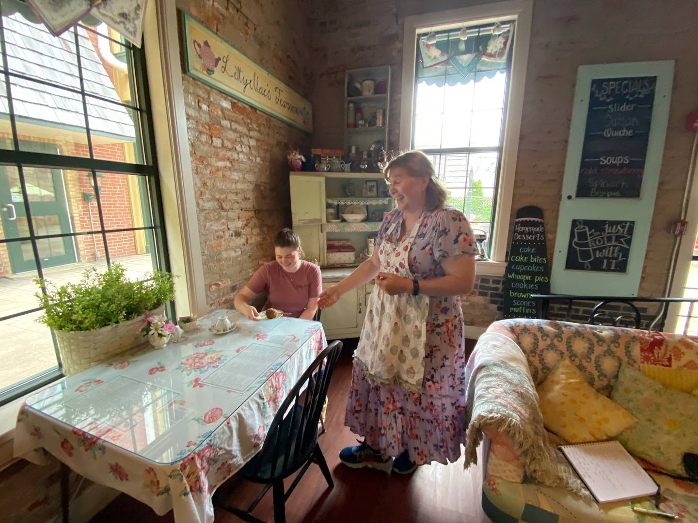 Ruth Brisco serves Anna White on Tuesday at Letty Mae's Tea Room.