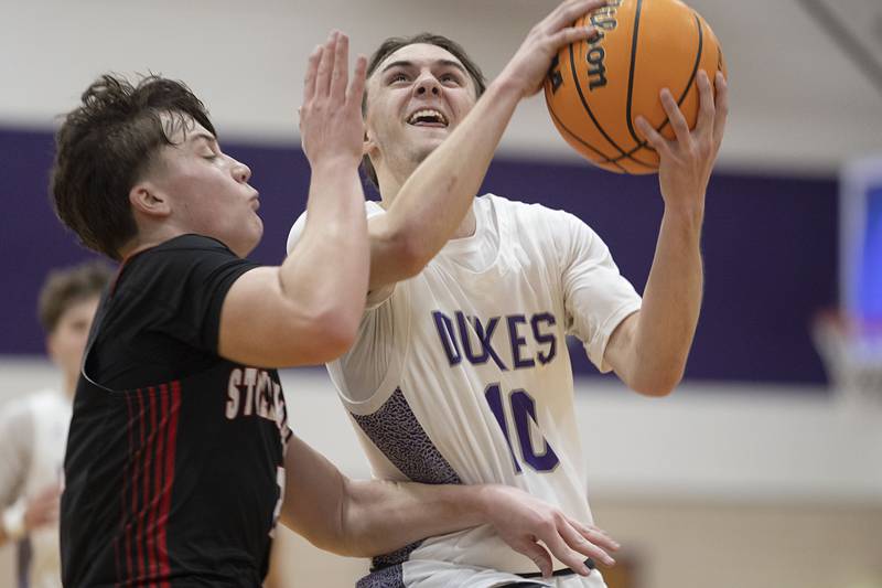 Dixon’s Brady Feit puts up a shot against Stillman Valley Friday, Jan. 9, 2026.