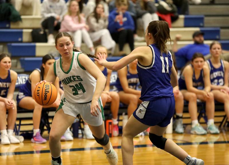 York’s Olivia Silkaitis drives toward the basket during a 4A Geneva Regional semifinal game against Geneva on Tuesday, Feb. 18, 2025 in Geneva.