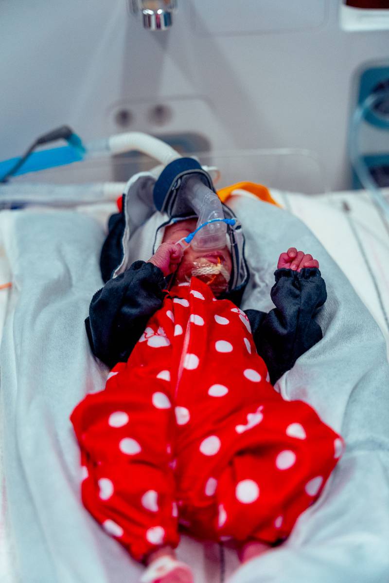 One of Minnie Mouse triplets at Silver Cross Hospital's NICU unit on Halloween 2025.