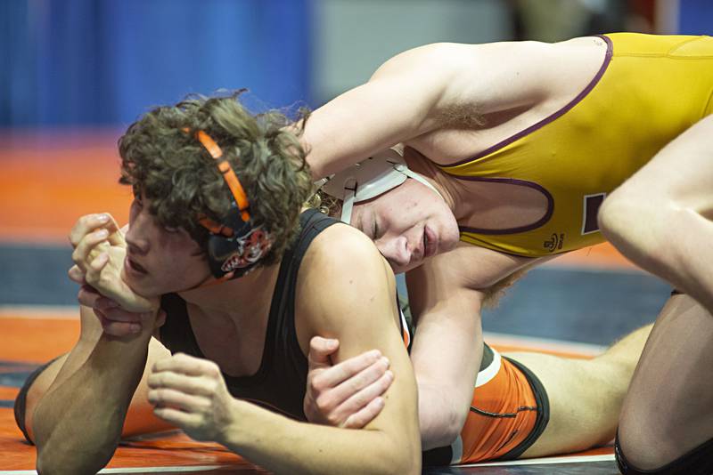 Brayden Thompson of Lockport handles Austin Gomez of Libertyville in the 170lb 3A semifinals.