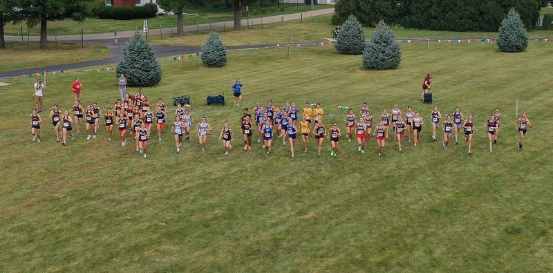 An aerial view of the varsity girls race as it kicks off during the Gary Coates Invitational cross country meet on Saturday, Sept. 13, 2025 at Zearing Park in Princeton .