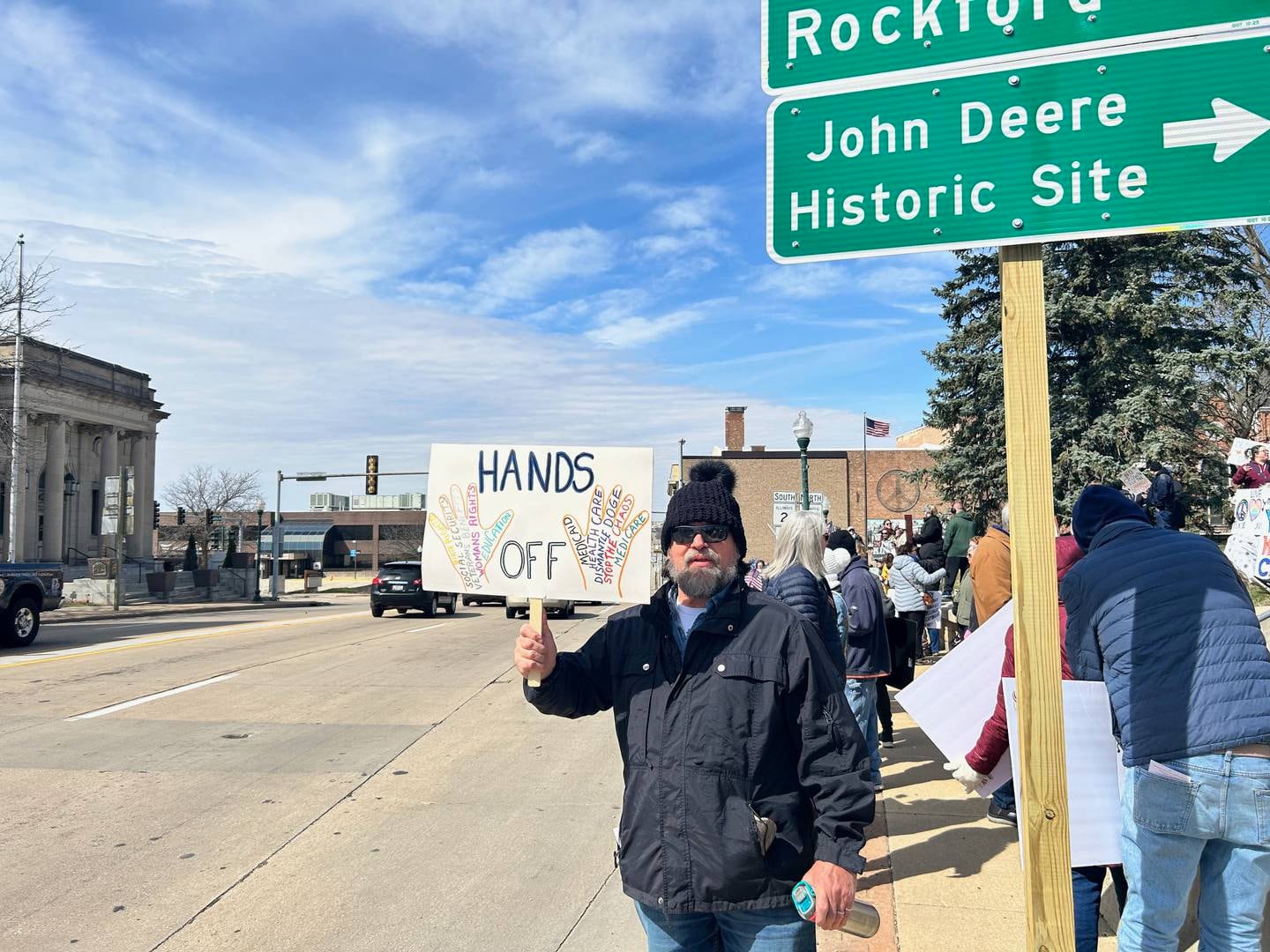 Frank Slowinski of Dixon holds a sign during a No Kings protest Saturday along Galena Avenue in Dixon.