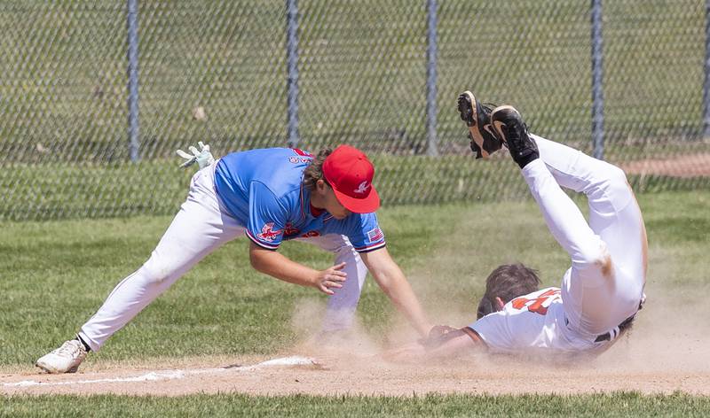 Oregon’s Logan Weems is late on the tag against Byron’s Caden Considine Saturday, May 24, 2025, in the Stillman Valley Class 2A Regional final.