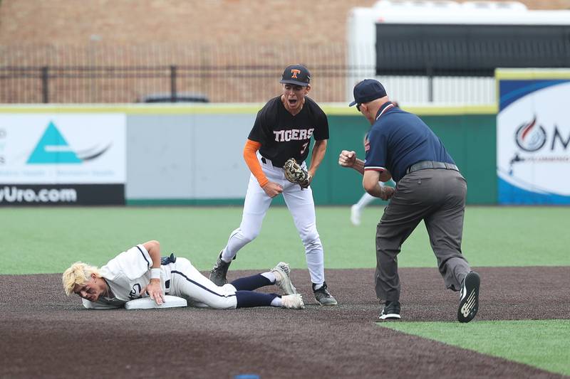 Crystal Lake Central’s James Dreher celebrates thwarting Lemont’s Max Michalak steal attempt in the IHSA Class 3A Championship game on Saturday June 8, 2024 Duly Health and Care Field in Joliet.