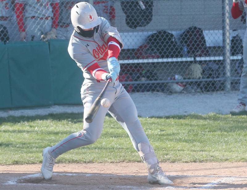 Ottawa's Adam Swanson makes contact with the ball against St. Bede on Wednesday, March 20, 2024 at St. Bede Academy.