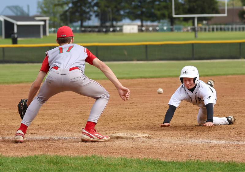 Kaneland's Caleb Cornell slides safely into third as La Salle-Peru’s Gavin Stokes takes the throw Tuesday, May 12, 2026, during their game at Kaneland High School in Maple Park.