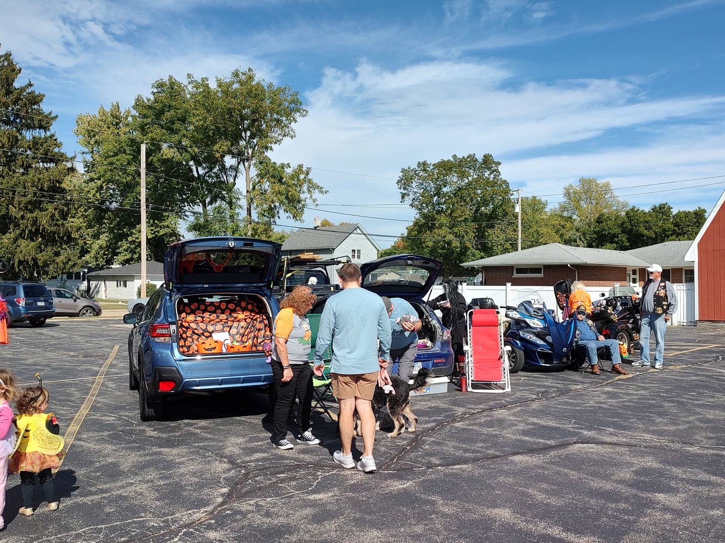 Pictured are the members Lori Meyer, Cliff Oleson, Cherie and Bob Mauer from Open Roads ABATE and their decorated car/bikes for the 2025 trunk or treat event held at the Plano Methodist Church.