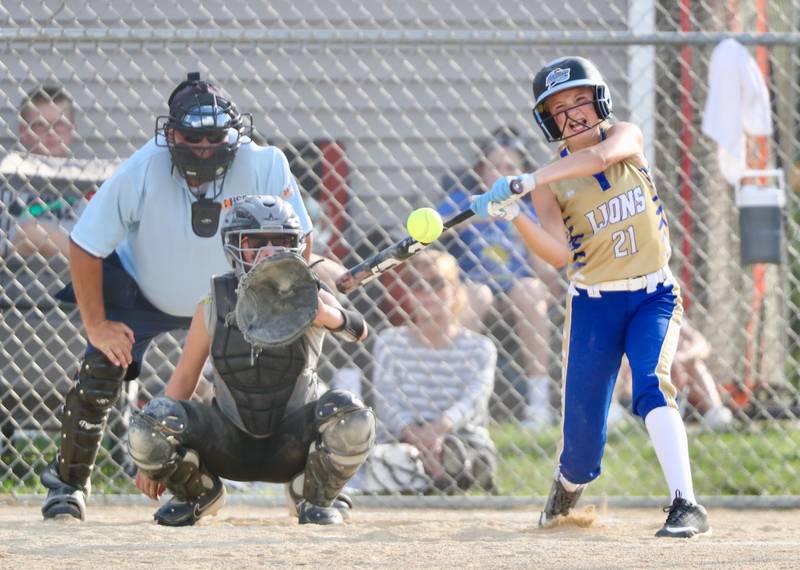 Princeton Logan's Payton Brandt takes her cuts in Thursday's season opener.