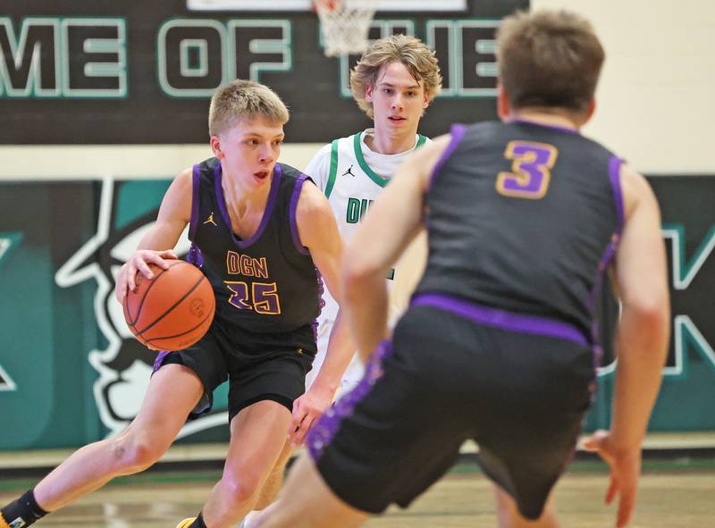 Downers Grove North’s Alex Miller (25) drives to the basket against York during a boys varsity basketball game on Saturday, Feb. 10, 2024 in Elmhurst, IL.