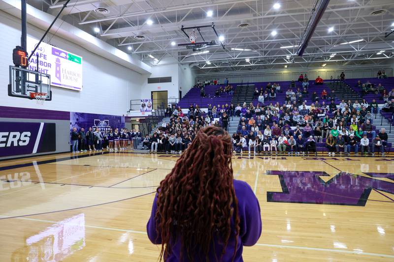Harbor House prevention advocate Stephanie speaks to the crowd as Manteno and Bishop McNamara hosted Safe Harbor Night, collecting donations during their game to benefit Harbor House on Tuesday, Jan. 13, 2026.
