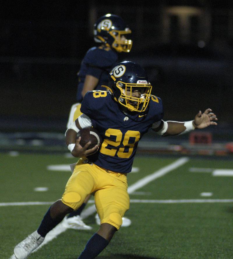 Sterling's Issac Ibarra stakes a handoffd  The Lions of Urban Prep traveled to Sterling to take on the Warriors at Prescott Memorial Field at Roscoe Eades Stadium, September 5, 2025.