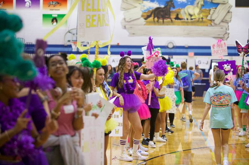 Downers Grove South freshmen enter the gym at the Mustang Mad Dash orientation on Saturday Aug.10, 2024 in Downers Grove.