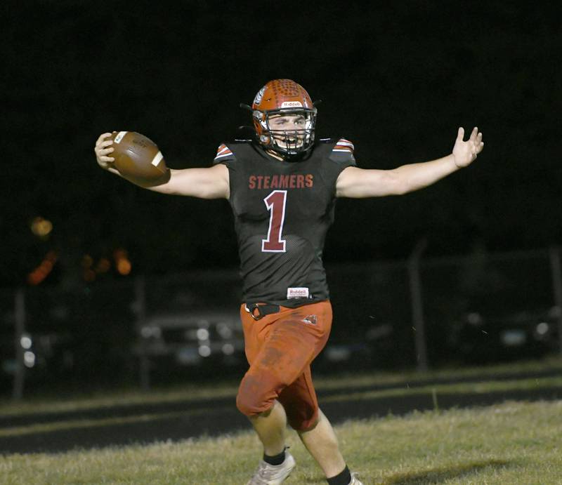 Fulton's Keegan VanKampen celebrates after running for a touchdown against Forreston.