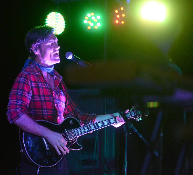 A member of Fortunate Sons, a Creedence Clearwater tribute band, sings during the Jamboree Concert Series in Mt. Morris on Friday, Aug, 29, 2025.