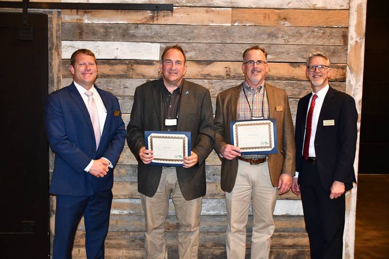 The Forest Preserve District of Will County recently named its Volunteers of the Year for 2021. From left are Forest Preserve Board President Joe VanDuyne, Volunteers of the Year Mark Bettin and Scott Mortenson, and Forest Preserve Executive Director Ralph Schultz.