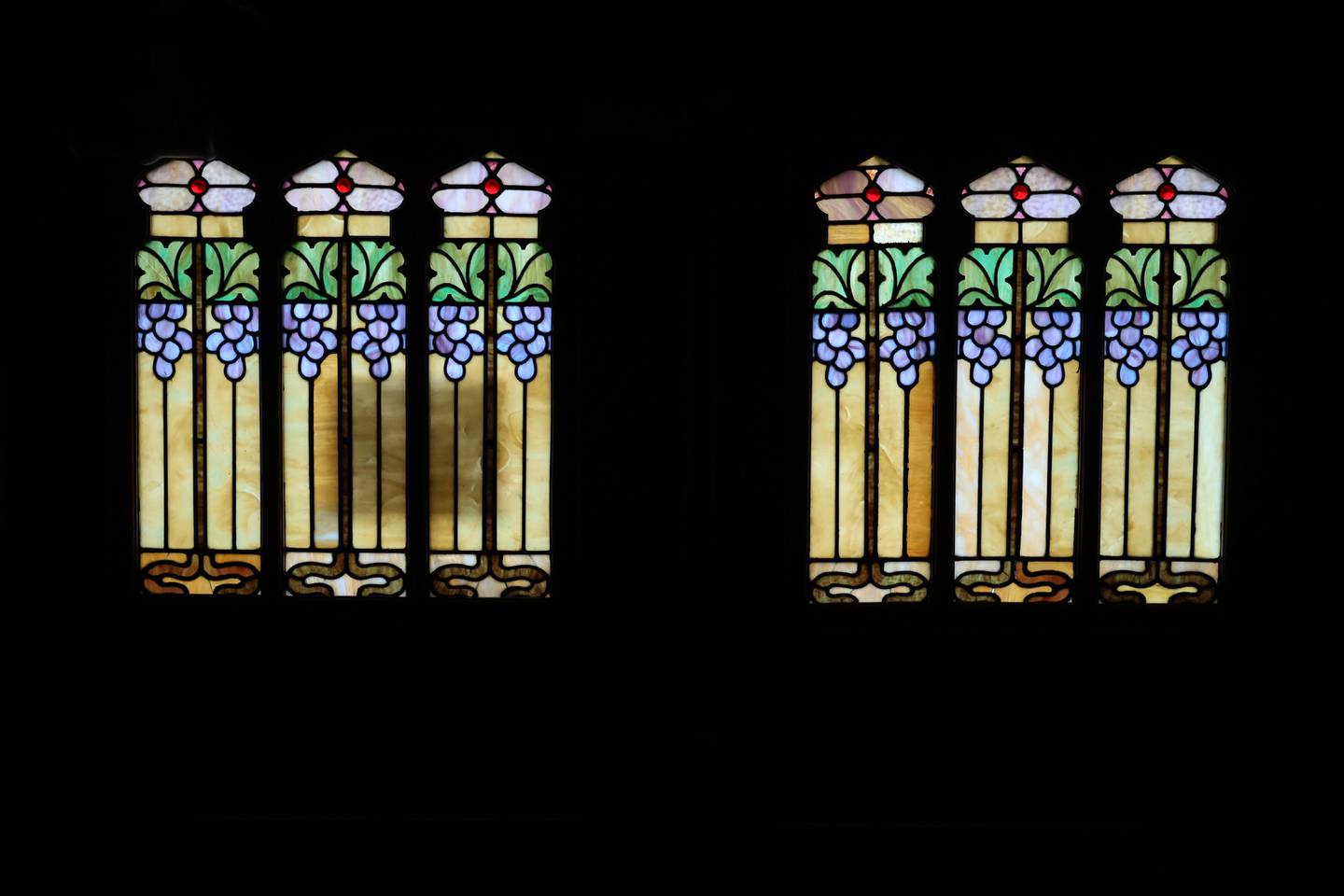 Light shines through the stain glass windows of the front doors of St. John’s United Church of Christ in Mokena on Wednesday, Sept. 14, 2022, in Mokena. St. John’s will celebrate the 100th anniversary of its current building on Sunday. The actual church community dates back to 1862.