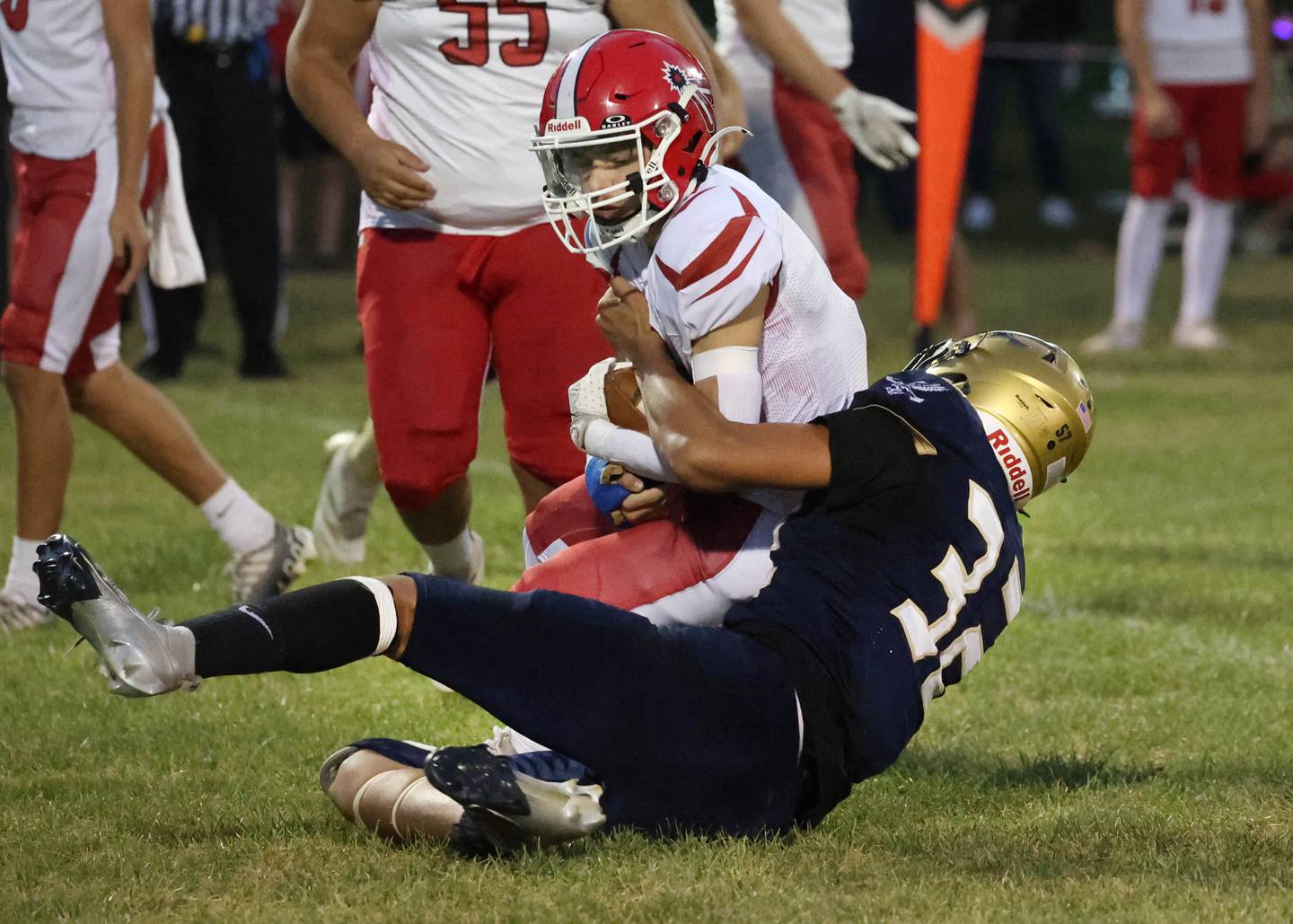 Hiawatha's Jayden Gray brings down South Beloit's Chase Herrington during their game Friday, Sept. 20, 2024, at Hiawatha High School in Kirkland.