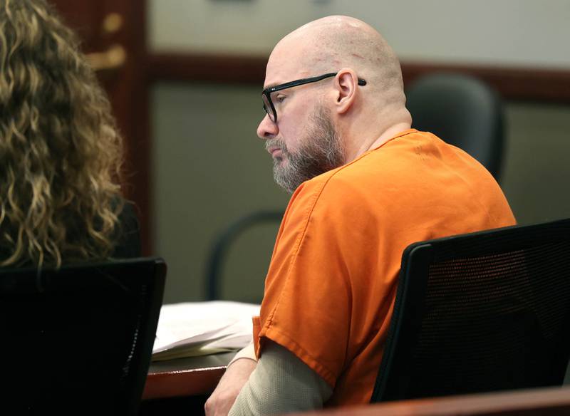 Jonathan D. Hurst, convicted of murdering Sycamore mother and son Patricia and Robert Wilson in 2016, listens as an impact statement is read by a family member of the victims Thursday, March 20, 2025, during his sentencing at the DeKalb County Courthouse in Sycamore. Hurst was sentenced to life in prison.