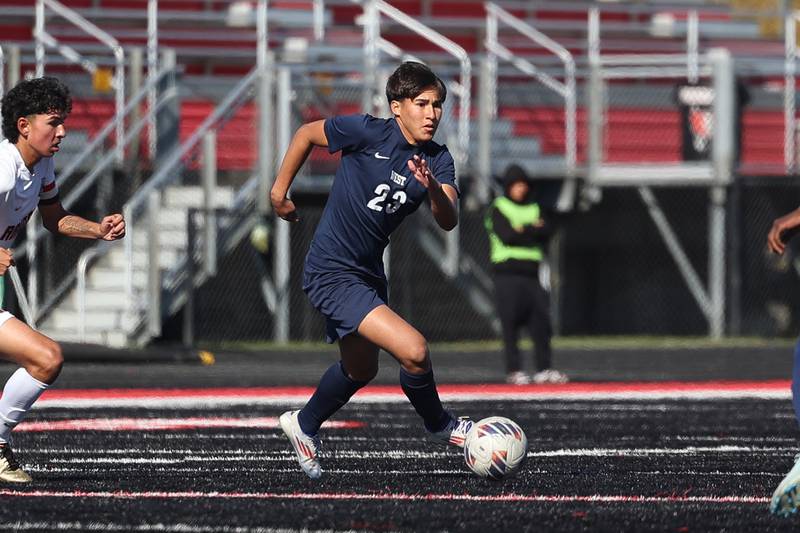 West Aurora’s Luis Medrano Cardenas works the ball against Bolingbrook in the Class 3A Bolingbrook Regional championship match on Saturday, Oct. 26, 2024 in Bolingbrook.