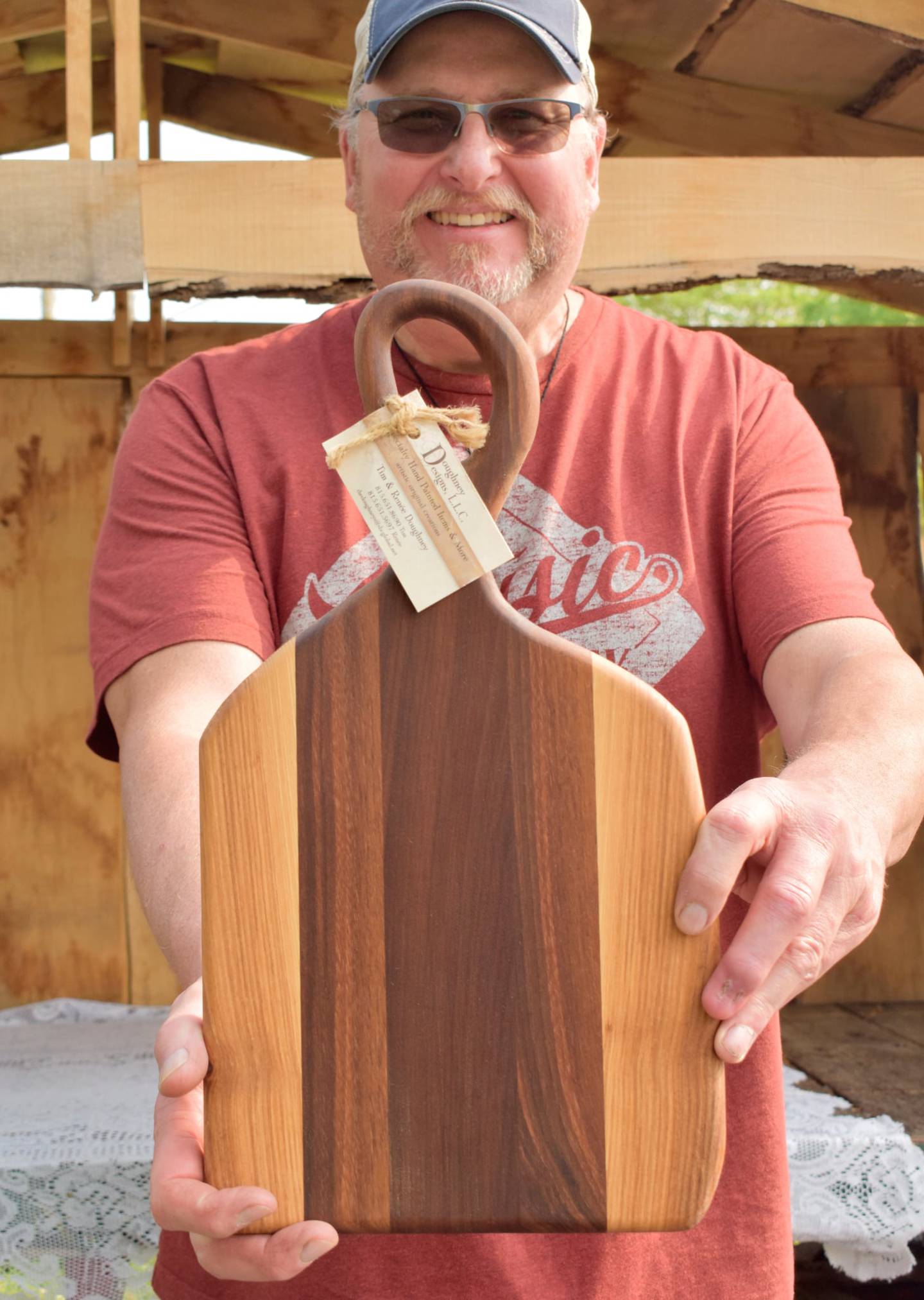 Doughney Designs: Tim Doughney (shown) at Blackberry Lane Farmstand in Channahon in June 2025.