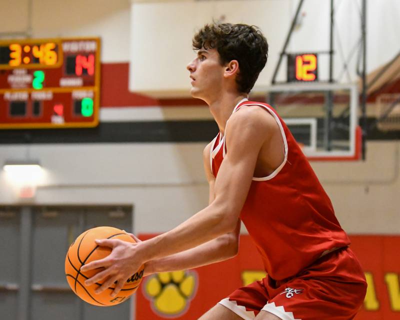 Hinsdale Central's Cole Bero (3) makes a three-point basket during the game on Saturday Jan. 24, 2026, while traveling to take on Batavia High School.