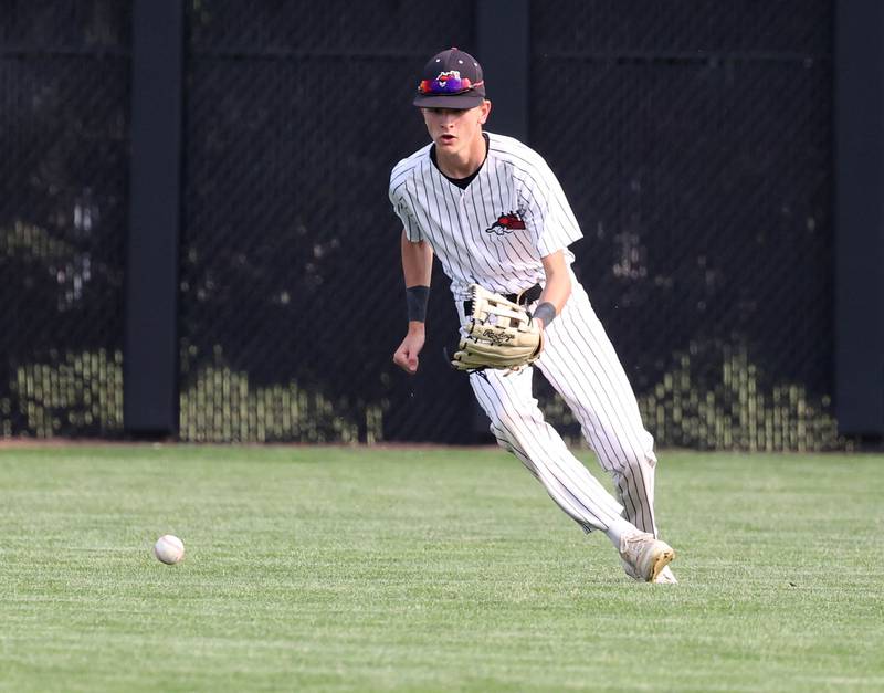 Fulton's Jacob Voss fields a ball in the outfield Monday, June 2, 2025, during their Class 1A supersectional game against Marquette at Northern Illinois University in DeKalb.