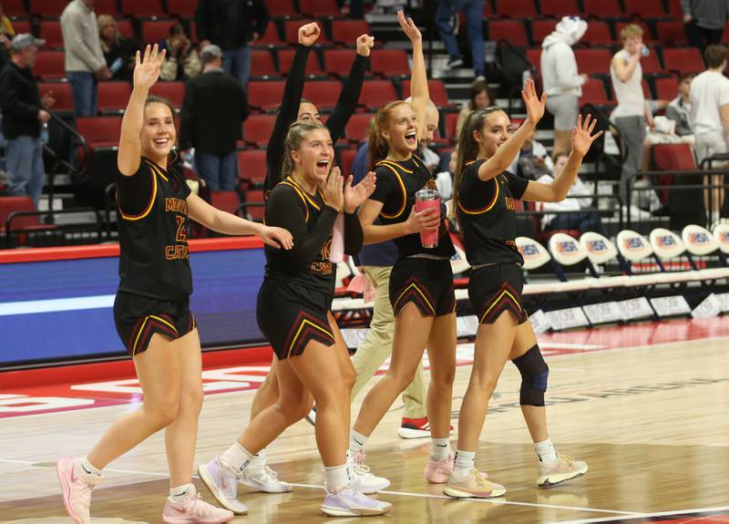 Montini Catholic starting players (from left) Peyton Farrell, Lily Spanos, Natalie Gartlan, Audrey Kinney and Nikki Kerstein wave to their fans while walking off the court after defeating Quincy Notre Dame during the Class 3A State semifinal game on Thursday, March 6, 2025 at CEFCU Arena in Normal.