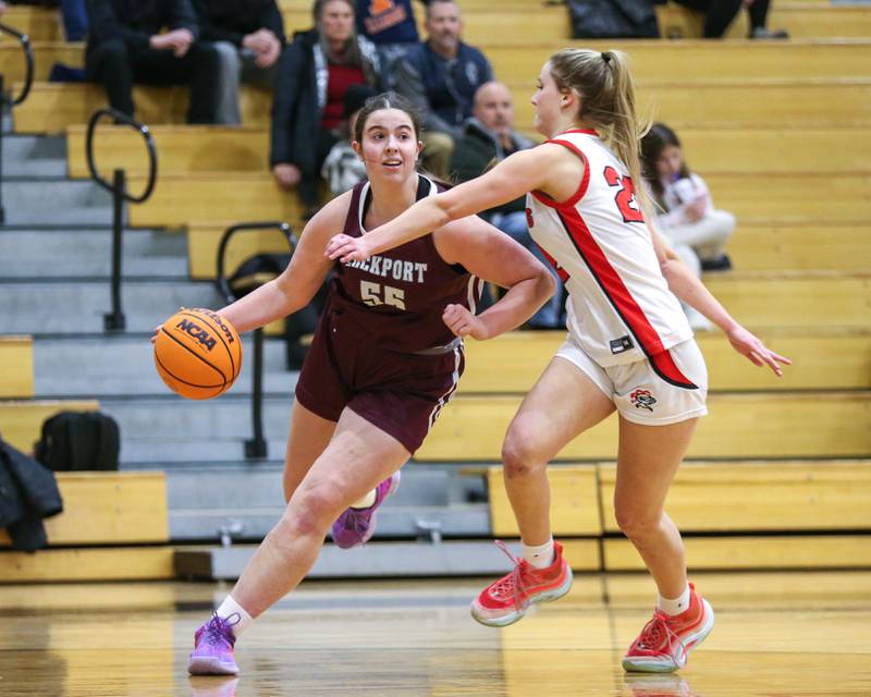 Lockport's Evelyn Ingram (55) drives past the defense in their game between Lockport at Lincoln-Way Central. Jan 21, 2025 in New Lenox.