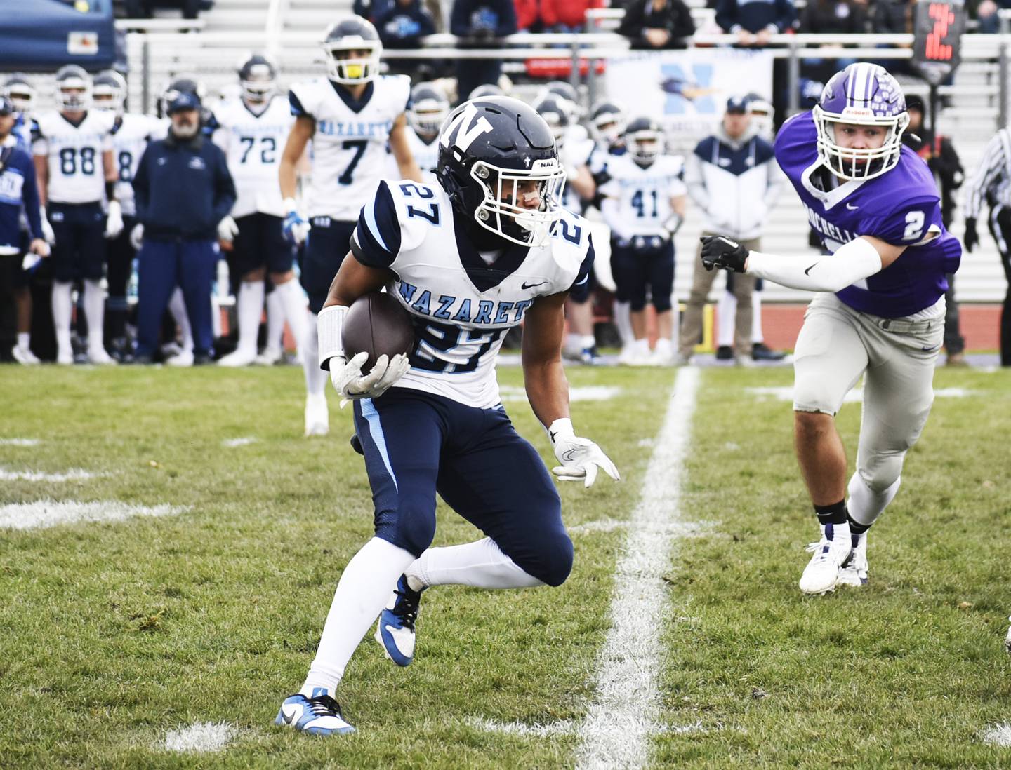Nazareth running back Charles Calhoun takes a carry during Class 5A quarterfinal game against Rochelle on Saturday.