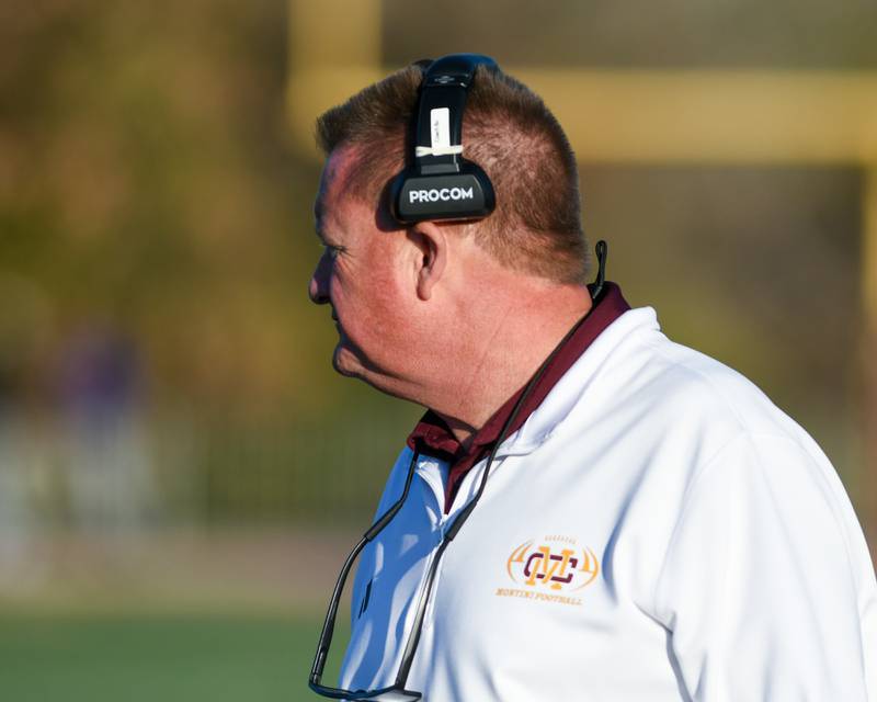 Montini Catholic's head coach Mike Bukovsky looks on during the game on Saturday Nov. 15, 2025, while taking on Coal City during the 4A quarterfinals game held at Montini Catholic High School.