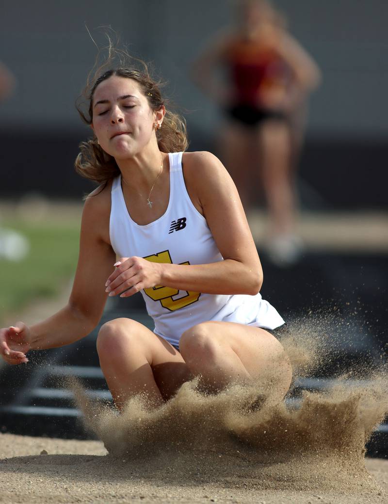 Carmel’s Lia D’Amore competes in the long jump in IHSA Class 2A Girls Sectional Track action at Genoa-Kingston School in Genoa on Friday, May 16, 2025.