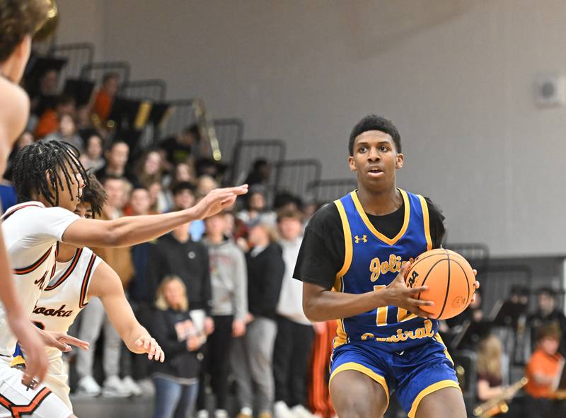 Joliet Central's Malachi Boatright (10) in action during a conference game against Minooka on Friday, Jan. 10, 2025, at Minooka.