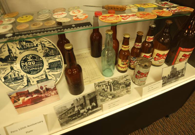 A view of vintage items in a display case on Tuesday, March 31, 2026 at the Peru City Hall. The Peru Historical Society has collected the memorabilia. They are looking for items to donate to the growing collection. The group meets the last Tuesday of each month inside Peru City Hall at 6:30p.m.