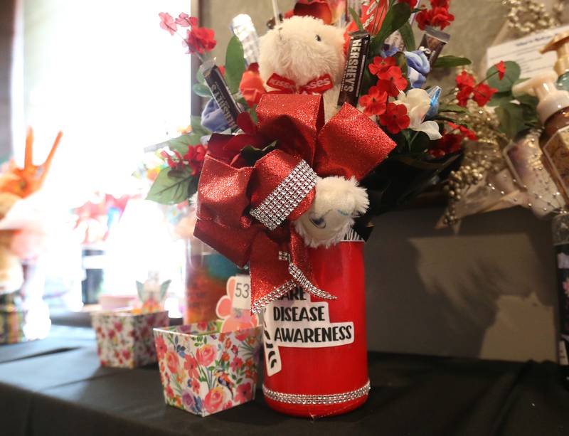 Over 130 raffel baskets were donated during the Lighted Way spaghetti dinner on Monday, April 28, 2025 at Uptown Bar & Grill downtown La Salle. The containers were made from recycled sandy wipes from the school.