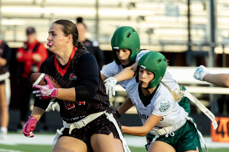 Yorkville's Kayla Kersting makes a nice move during the IHSA Danville Sectional varsity flag football game against Plainfield Central at Plainfield East on Oct. 13, 2025.