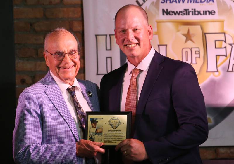 St Bede alumnus Joe Perona poses with emcee Lanny Slevin during the 2025 Shaw Media Illinois Valley Sports Hall of Fame at the Auditorium Ballroom in La Salle.