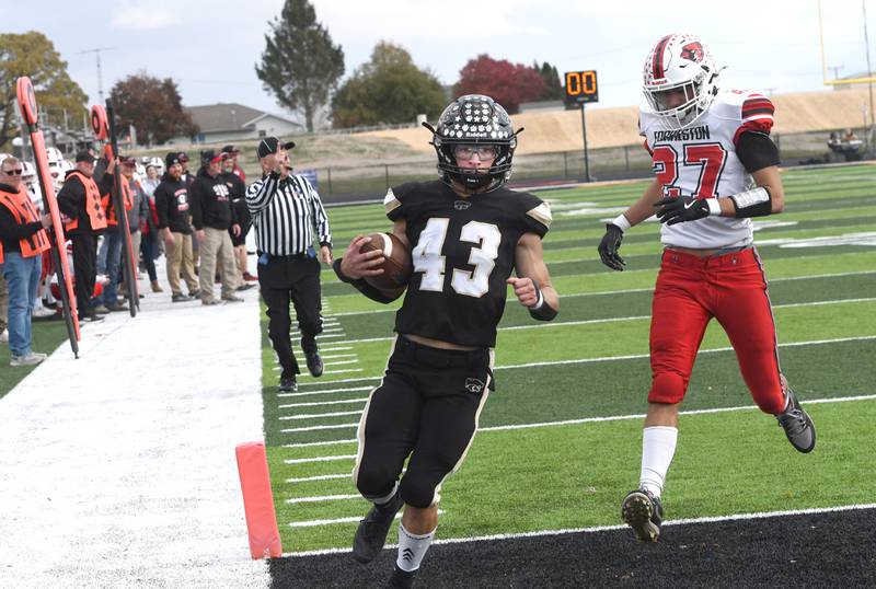 Lena-Winslow's Alec Schlichting (43) beats Forreston's Jonathan Milnes (27) to the end zone for a touchdown during 1A playoff action in Lena on Saturday, Nov. 1, 2025.
