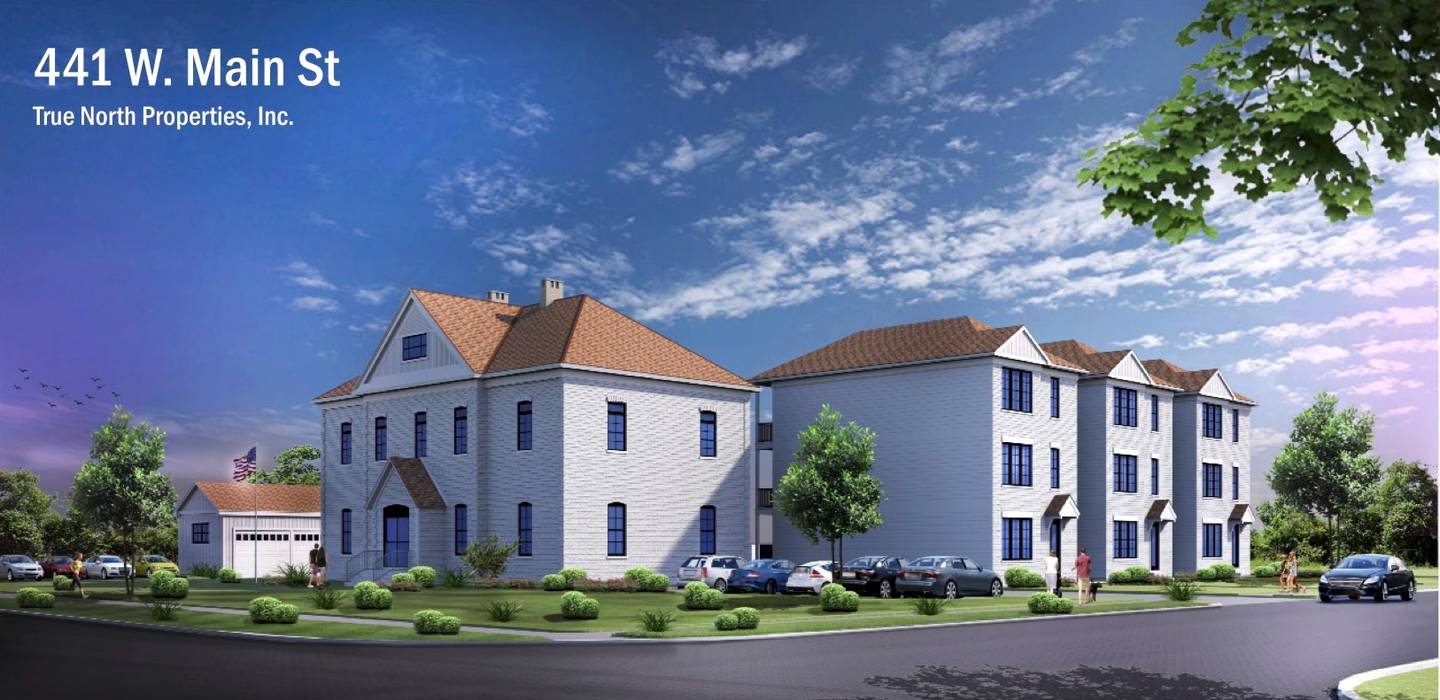 A rendering for a possible repurposing of the parcel at 441 West Main Street in Cary, which includes a historic school building over 120 years old; an initial concept by True North Properties, Inc., shown here, includes several small apartment buildings and garage units designed to match the original structure.