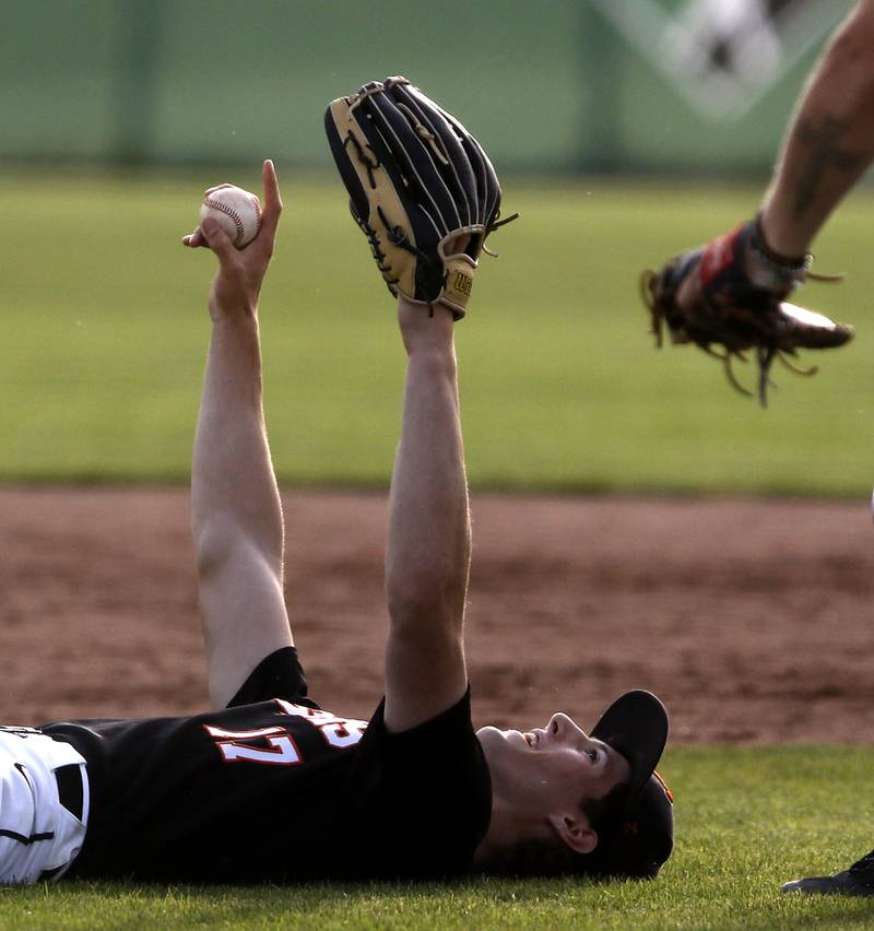 Crystal Lake Central's Connor Gibour celebrates the final out and defeating Deerfield 6-2 in the Class 3A Grayslake Central sectional championship baseball game on Friday, May 31, 2024, at the Grayslake Central High School. I love this photo for the per joy Gibour shows as they win and move on to state.