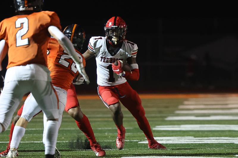 Bolingbrook’s Kyan Berry-Johnson cuts upfield after a catch against Lincoln-Way West on Friday, Sept. 22 in New Lenox.