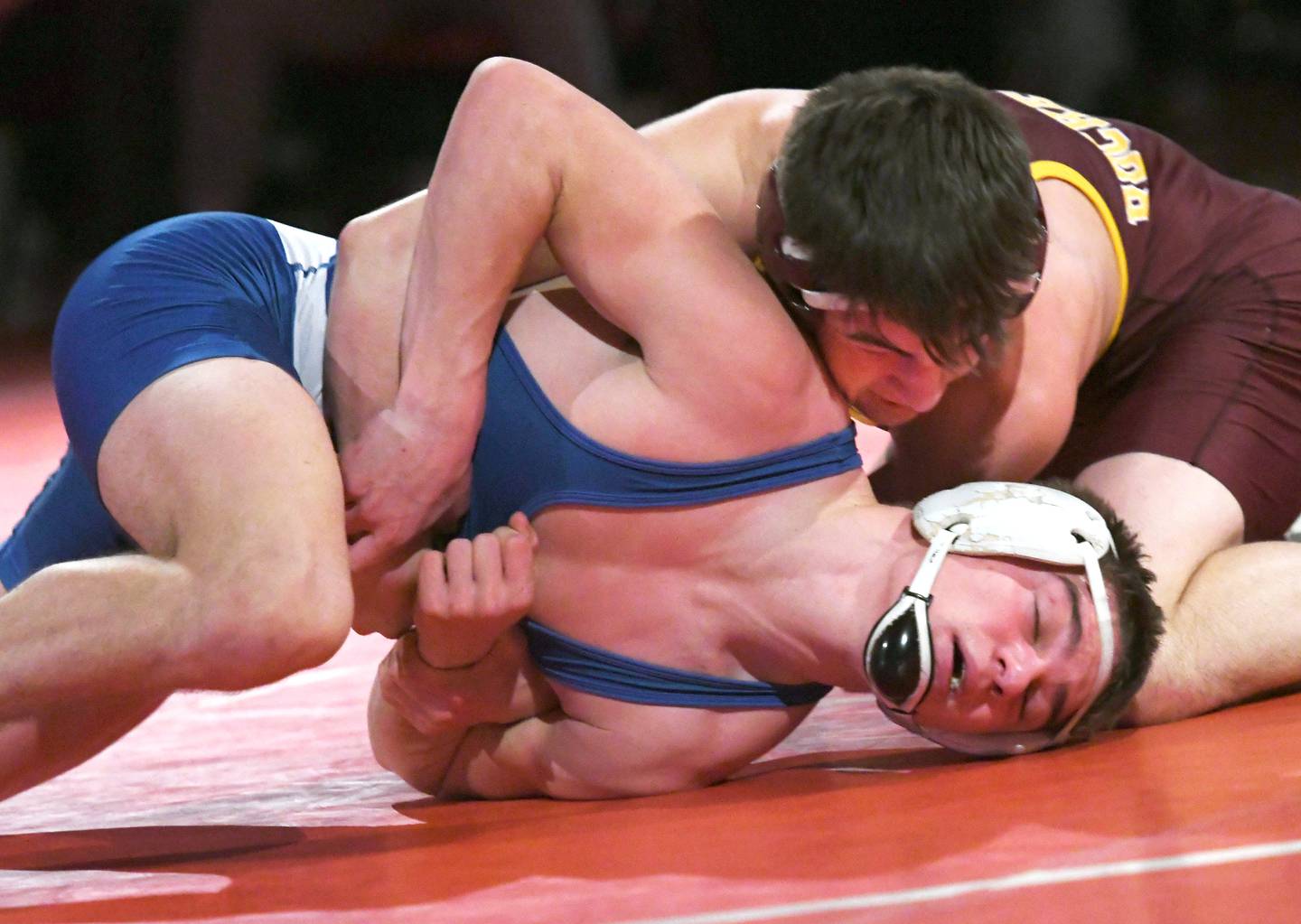 Newman's Brady Grennan (bottom) tries to break the hold of Richmond Burton's Emmett Nelson during the third place match at 126 pounds during the 1A Oregon Wrestling Sectional on Saturday. Nelson won the match, but both wresetlers advance to the state finals.