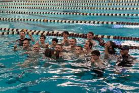 Lockport boys win swimming sectional, advance to state in seven events