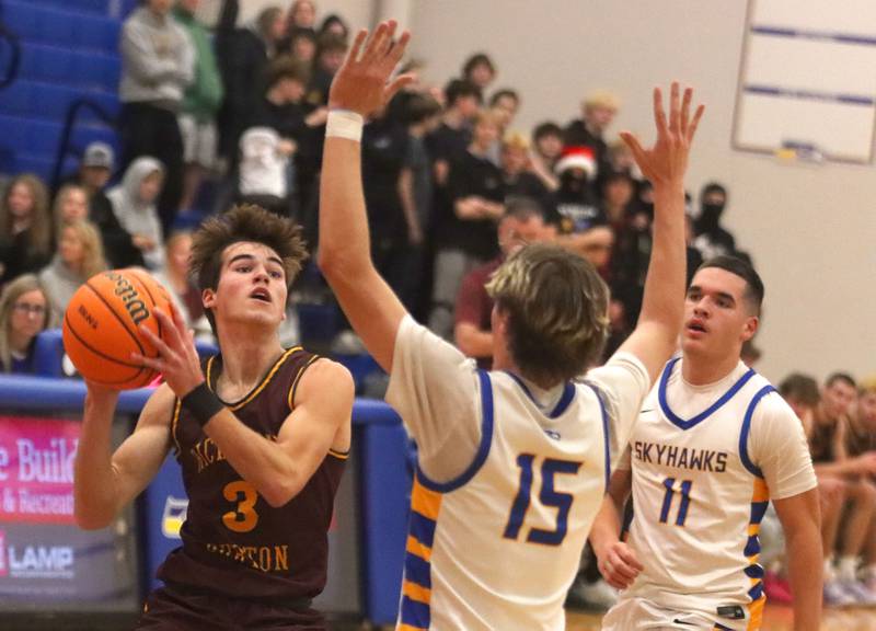 Richmond-Burton’s Dane Gardner takes a look at the hoop in varsity boys basketball onTuesday, Dec. 9, 2025, at Johnsburg High School in Johnsburg.