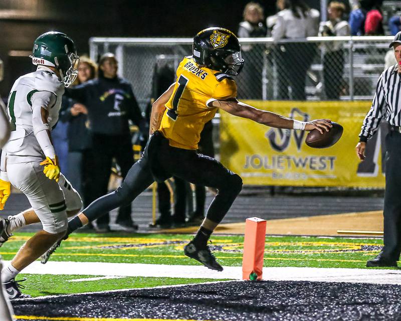 Joliet West's Antoine Brooks (1) scores a touchdown during a football game between Plainfield Central at Joliet West on Friday, Oct 25th, 2024  in Joliet.