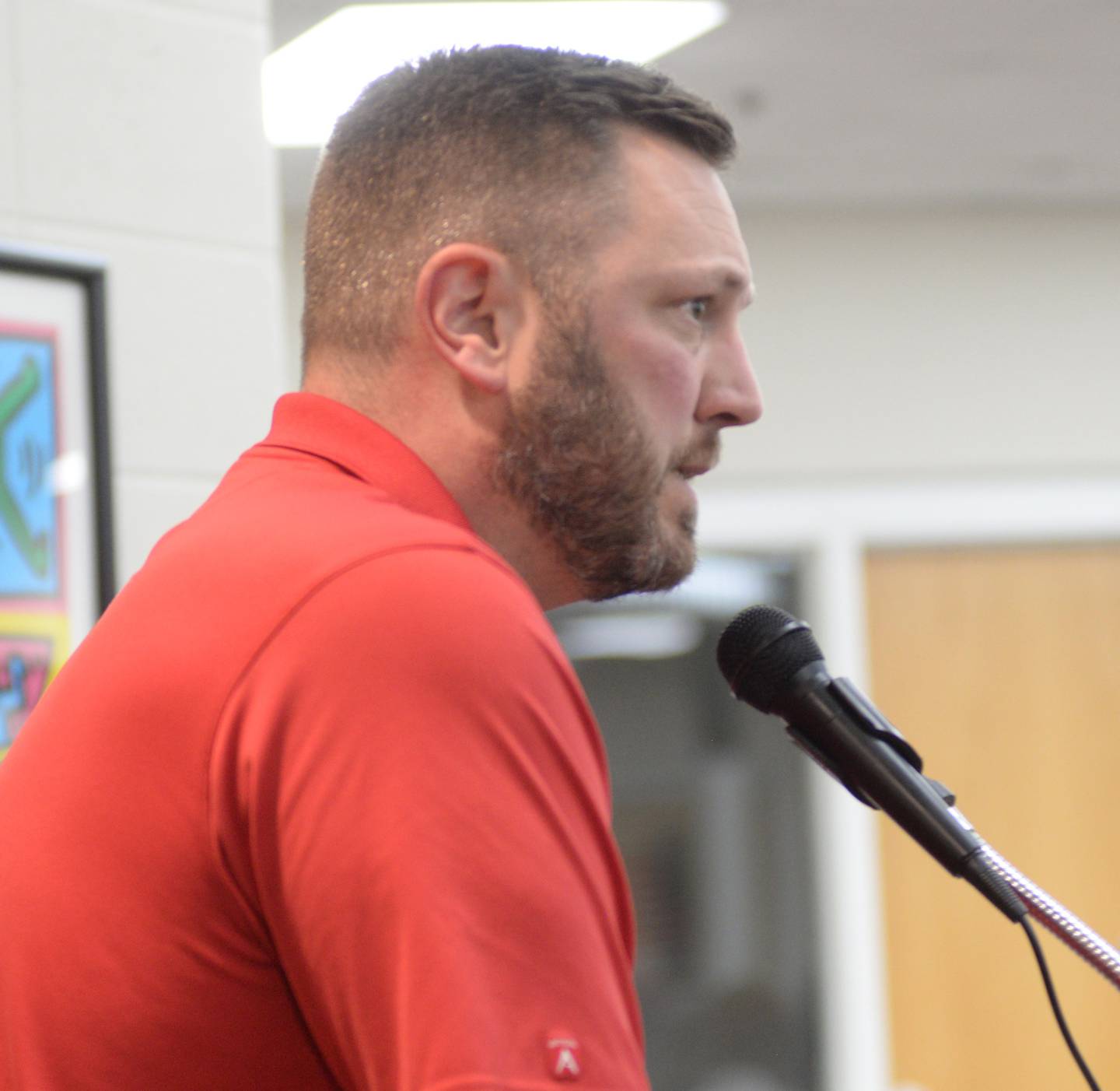 Andrew Garnhart speaks in favor of  proposed $10 million sports complex addition for the Forreston Junior Senior High School during an April 15, 2026, public hearing prior to the Forrestville Valley School Board meeting. The purpose of the hearing was to receive public comment regarding a proposal to sell bonds to fund the addition.